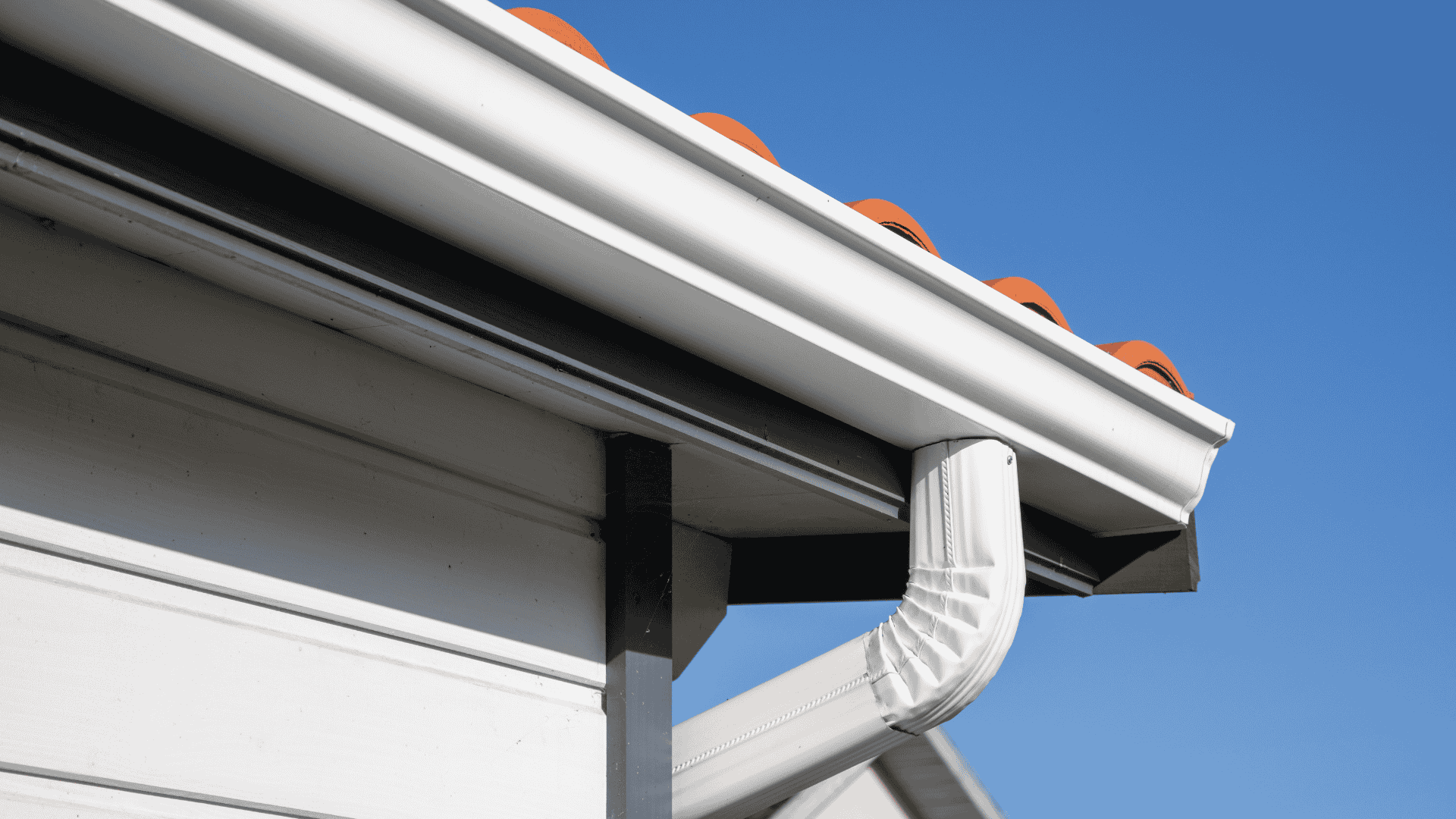 seamless gutter system installed on residential home Dallas Fort Worth