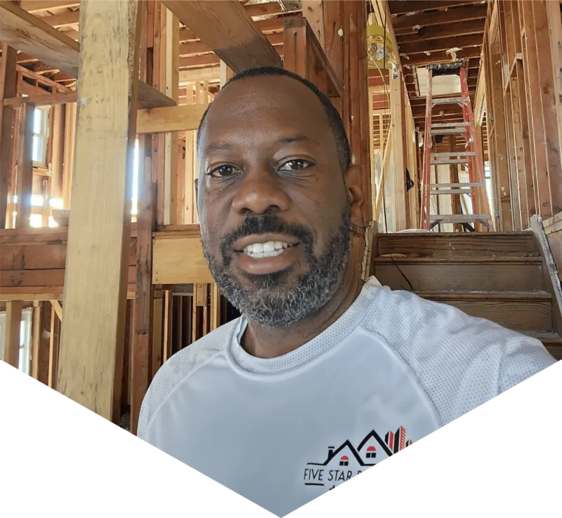 roofing professional inside home construction site Dallas Fort Worth