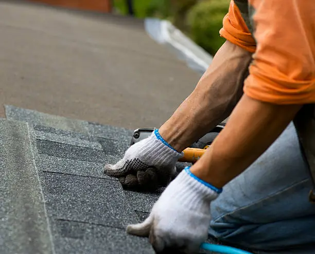 Roof inspection underway on a shingle home in a Wylie neighborhood