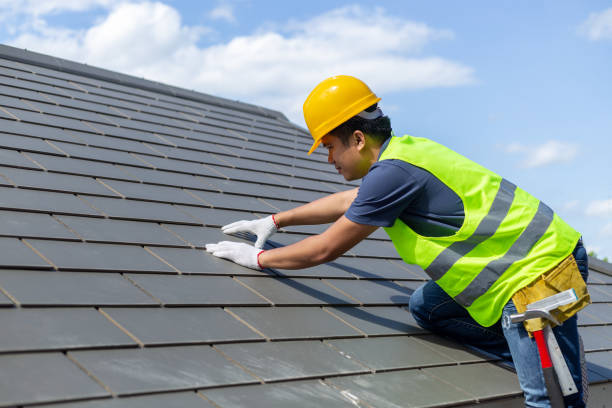 Roofing crew replacing storm-damaged shingles on Lancaster home during scheduled daytime project, Roofing team inspecting damaged shingles and flashing on a Murphy neighborhood home, Roofing crew inspecting shingle damage on a residential roof in Waxahachie neighborhood