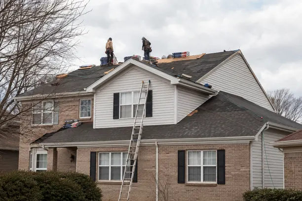 Roof replacement team in Cedar Hill - TX checking underlayment and roof ventilation before shingle installation